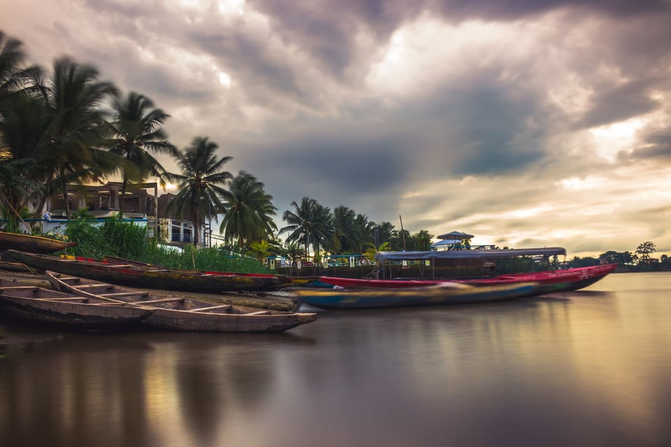 Riverside boats at sunset in Douala, Cameroon 